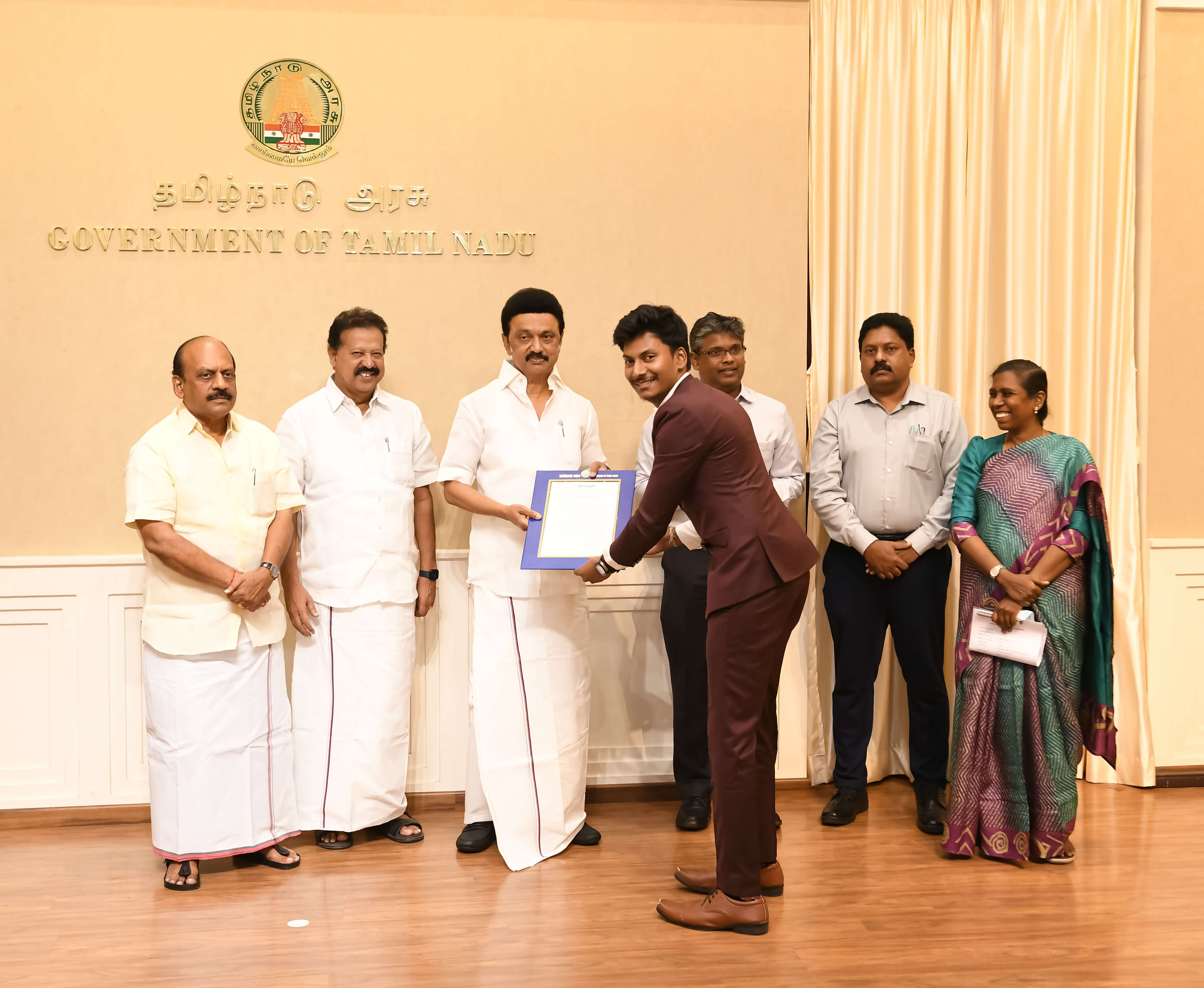 Sathya Narayanan receiving award from CM